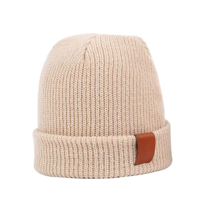 a knit hat with a leather band